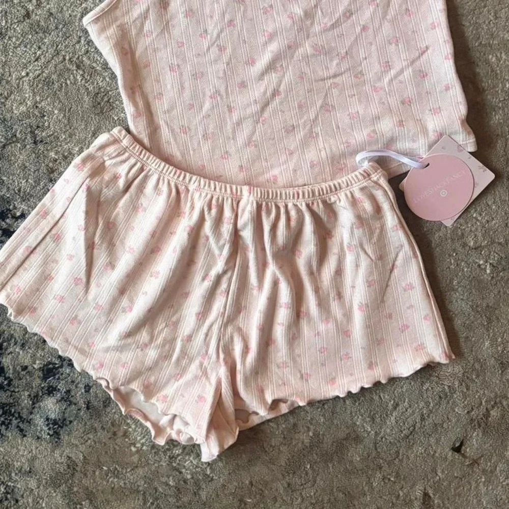 Pink floral lounge / matching pj set from Loveshackfancy in youth XXL